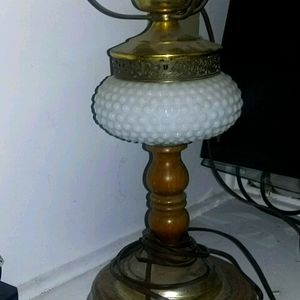 Lamp with milk glass globe and wood and metal
